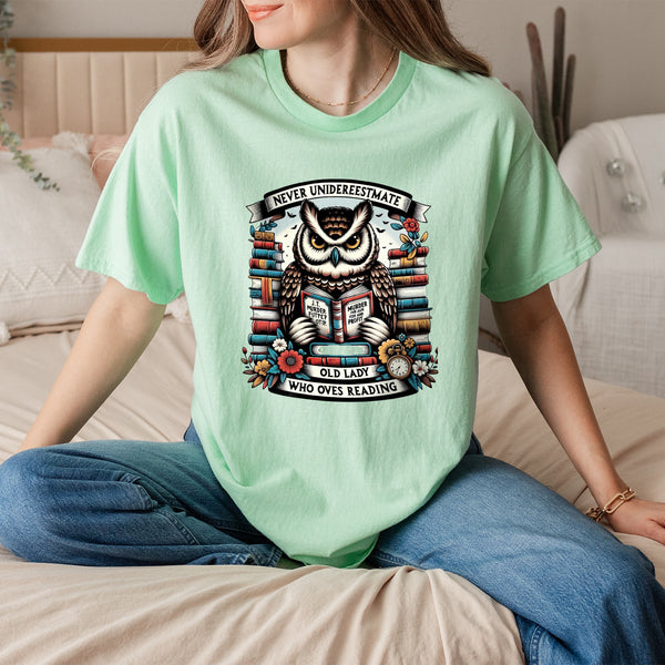 "Never Underestimate an Old Lady Who Loves Reading" – 100% Cotton Tee